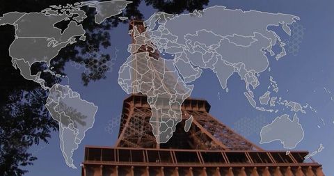 Eiffel Tower Overlaid with World Map Grid Signifying Connectivity