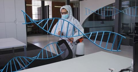 Disinfecting office wearing protective coverall and carrying backpack sprayer with dna overlays
