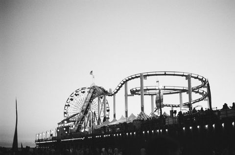 Black and White Ferris Wheel in Amusement Park at Dusk