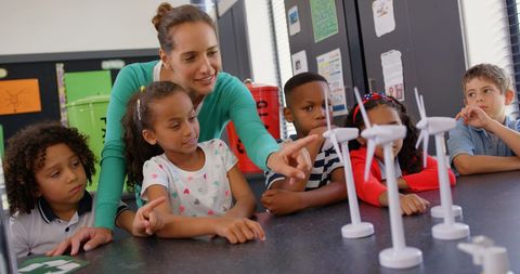 Teacher engaging diverse students in wind energy classroom activity