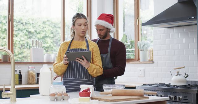 Couple Preparing Holiday Meal Baking in Kitchen Together - Download Free Stock Images Pikwizard.com