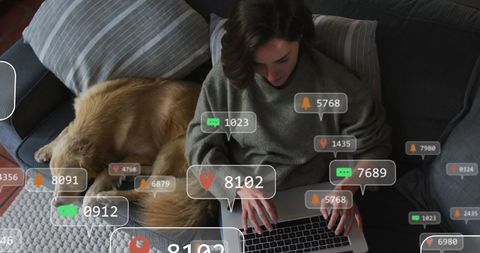 Woman Interacting Online with Sleeping Dog Beside