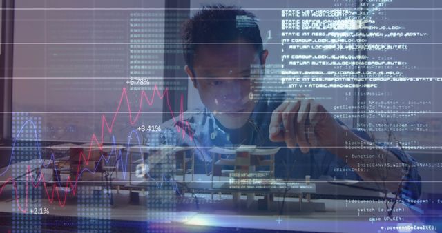 Focused Engineer Working on AI Programming with Financial Data Overlay - Download Free Stock Images Pikwizard.com