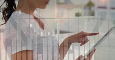 Businesswoman Analyzing Data on Tablet with Overlay Graphs