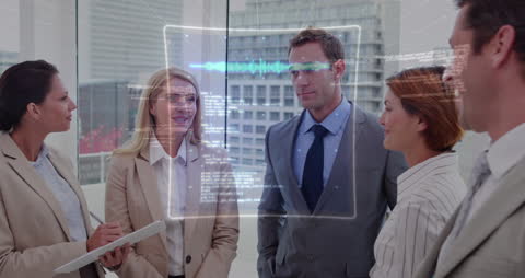 Business Professionals Analyzing Digital Data