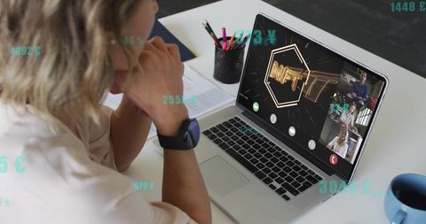 Businesswoman watching NFT presentation during remote video conference on laptop