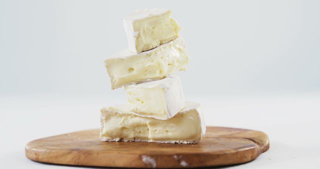 Stacked Brie Cheese on Wooden Board - Download Free Stock Images Pikwizard.com