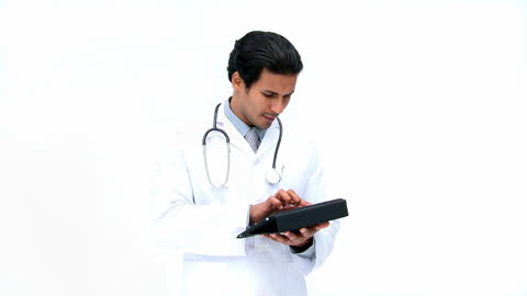 Doctor Using Digital Tablet in Professional Healthcare Setting