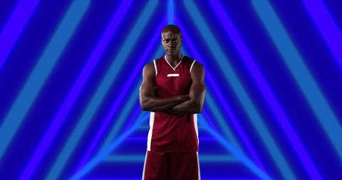 Confident Basketball Player Standing with Futuristic LED Triangle Background