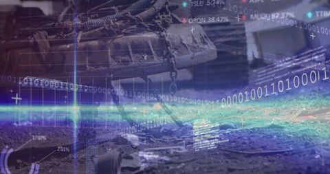 Magnetic crane lifting scrap metal at high-tech scrap yard