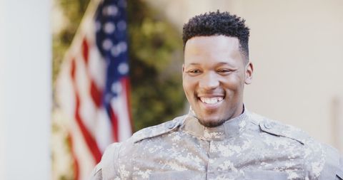 Smiling African American Soldier with US Flag in Background - Download Free Stock Images Pikwizard.com