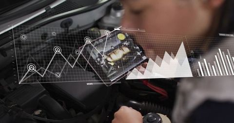 Female Technician Inspecting Car Engine While Holding Tablet with Augmented Analytics HUD