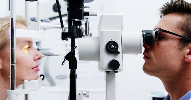 Optometrist Conducting Eye Exam with Modern Equipment - Download Free Stock Images Pikwizard.com