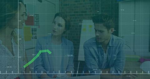 Team Analyzing Business Metrics in Modern Office