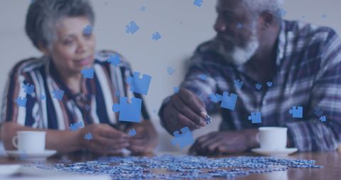 Senior Couple Assembling Jigsaw Puzzle at Home - Download Free Stock Images Pikwizard.com