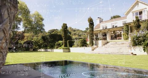Sunlit estate backyard featuring reflecting pool, manicured lawn and handwritten math overlay
