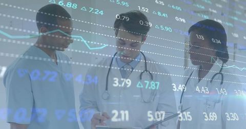 Healthcare Team Analyzing Financial Data with Digital Overlay