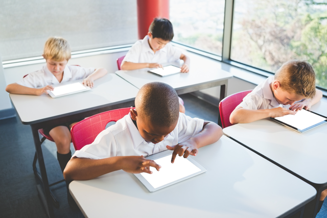 Children in Classroom Using Transparent Screen Tablet Technology - Download Free Stock Videos Pikwizard.com