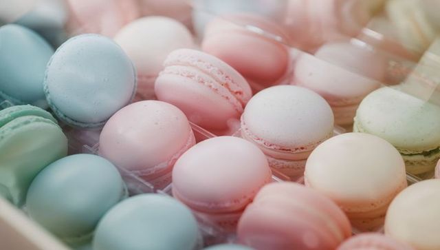 Elegant Pastel Macarons Displayed in Trays
