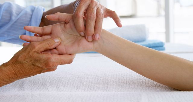 Elderly Physiotherapist Providing Hand Therapy Session - Download Free Stock Images Pikwizard.com