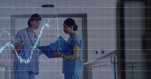 Medical Professionals Analyzing Digital Charts
