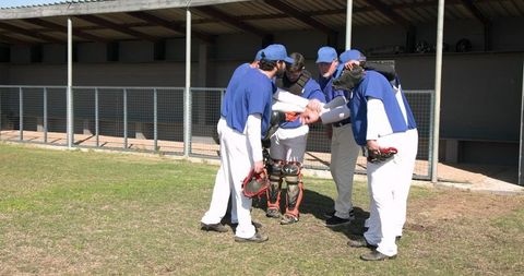 Teamwork and Camaraderie Among Baseball Players on Field