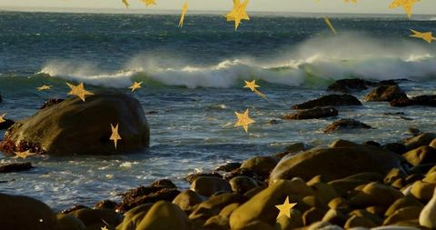 Golden star shimmer over rocky coastal seascape