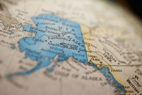 Close-up of vintage map highlighting alaska and surrounding regions