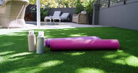 Outdoor Workout Mats on Grass with Bottled Water