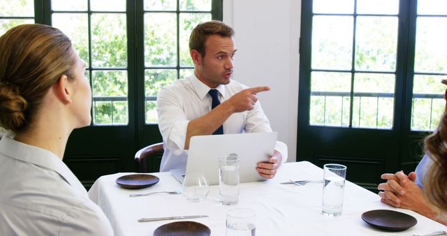 Business Team Having Meeting in Restaurant - Download Free Stock Images Pikwizard.com