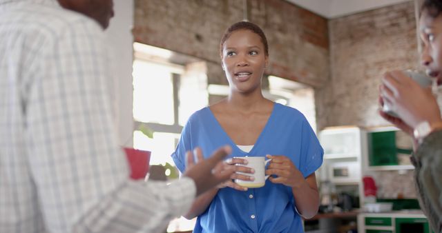 Casual Office Conversation During Coffee Break - Download Free Stock Images Pikwizard.com