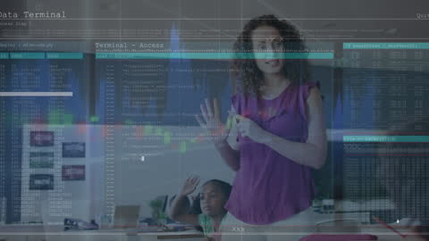 Engaged Teacher Explaining Digital Concepts to Students