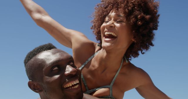 Joyful Couple Enjoying Beach Day in Summer - Download Free Stock Images Pikwizard.com