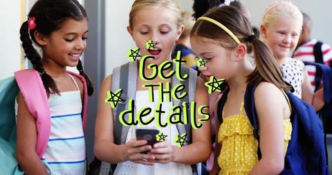 Elementary girls sharing smartphone in hallway with backpacks, neon get details text