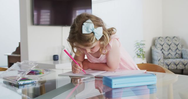 Young Girl Drawing with Pink Marker on Paper at Home - Download Free Stock Images Pikwizard.com