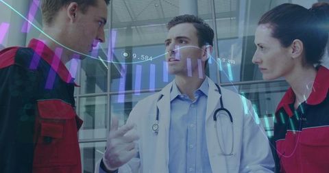 Physician briefing emergency responders with health data overlays in hospital atrium