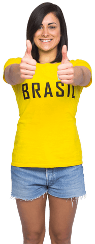Enthusiastic football fan in brasil shirt giving thumbs up transparent