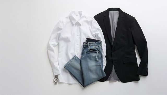 Men's smart casual outfit showcasing white dress shirt, faded denim jeans and black blazer