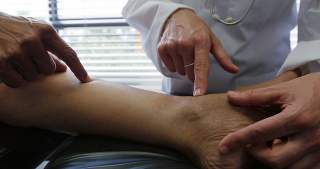 Doctor Examining Swollen Ankle for Medical Diagnosis - Download Free Stock Images Pikwizard.com