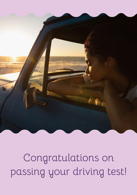 A biracial woman is relaxing in a car by a sunny beach at sunset, celebrating after passing her driving test. It is ideal for congratulatory cards, driving school promotions, travel brochures, or motivational content focused on achievement and freedom.
