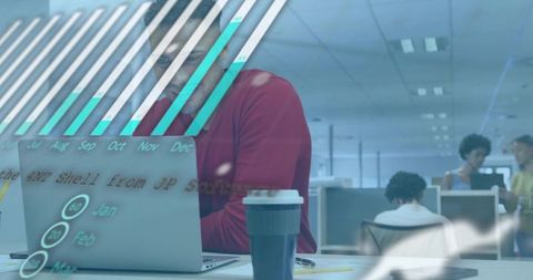 Modern professional analyzing data on laptop with coffee