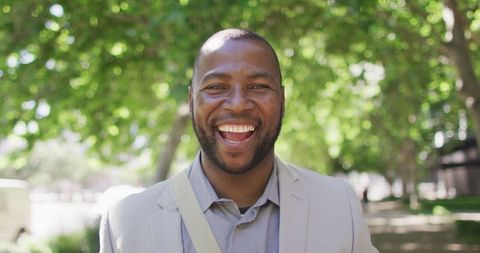 Joyful Portrait of African American Man in Urban Park