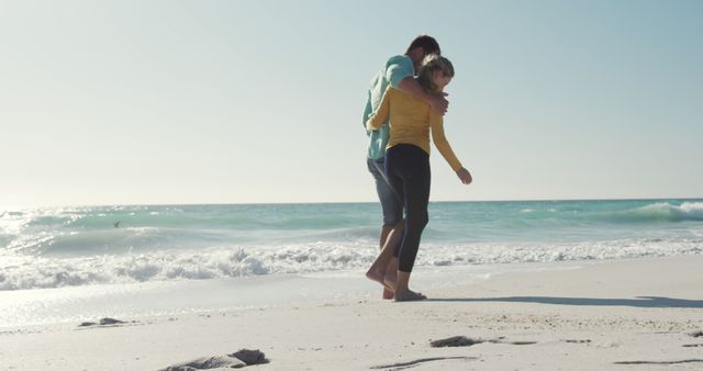 Happy Couple Relaxing Together on Sandy Beach - Download Free Stock Images Pikwizard.com