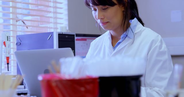 Female Scientist Working in Laboratory on Laptop - Download Free Stock Images Pikwizard.com