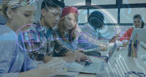 Diverse Coworkers Analyzing Data on Digital Technology Interface