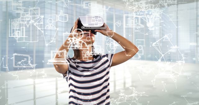 Woman Experiencing Virtual Reality Technology in Modern Office Environment - Download Free Stock Images Pikwizard.com