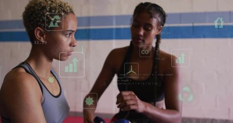 Athletes wrapping hands for boxing with hologram graphics