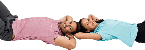 smiling couple lying on floor with hands behind their heads, appearing carefree and joyful. perfect for use in designs emphasizing relaxation, intimate connections, or as a happiness lifestyle concept feature.