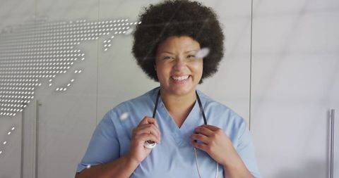 Smiling Nurse with Stethoscope and World Map Overlay