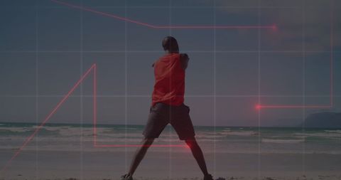 tech-enhanced athlete stretching on beach - Download Free Stock Images Pikwizard.com